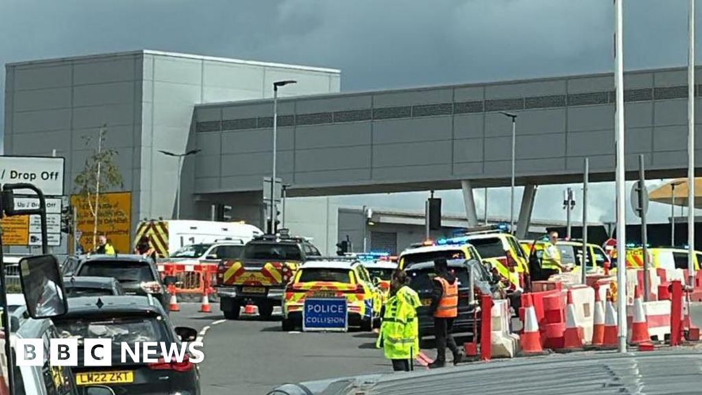 Man hurt after vehicle falls from car park