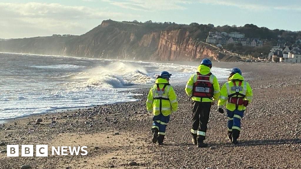 Two men believed missing after Budleigh Salterton swimmers search